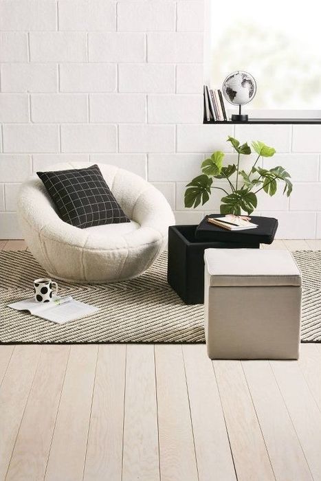 An image of a swivel Sherpa accent chair.