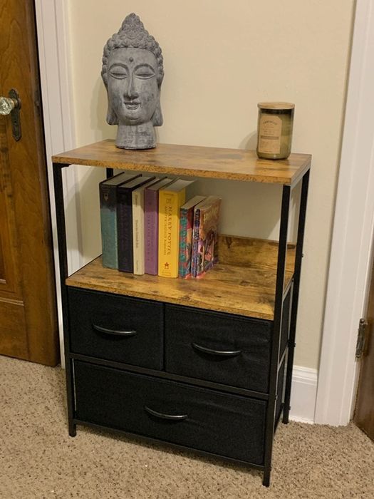 Reviewer photo showing a small fabric dresser placed in a hallway