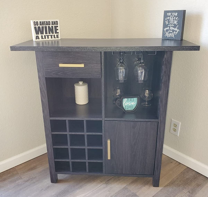 Reviewer image of a brown mahogany bar cabinet with built-in storage drawers
