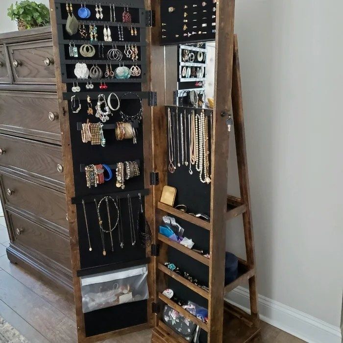 Reviewer’s photo of the jewelry armoire in Rustic Brown, open