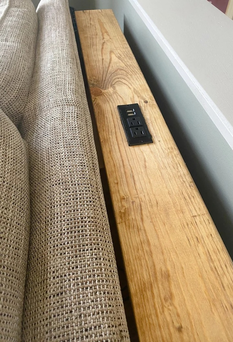 A close-up view of the charging outlets on the table