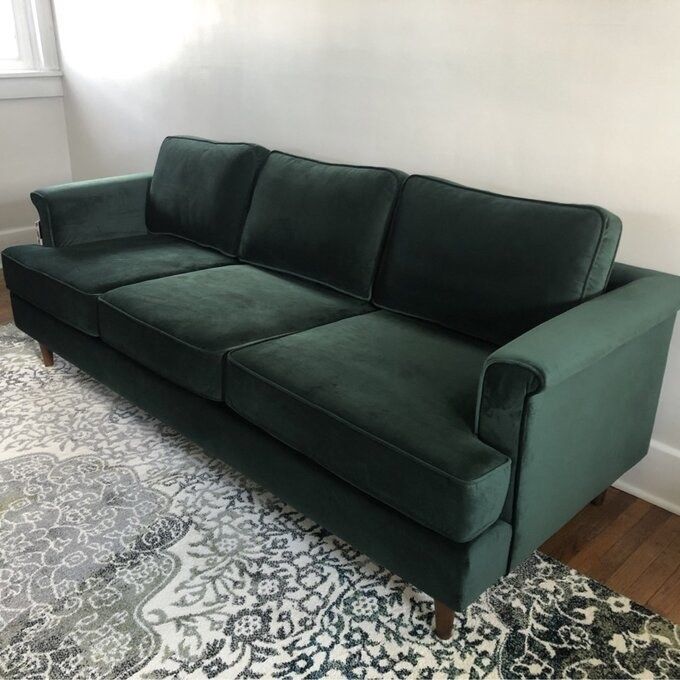 a reviewer photo showcasing the green couch