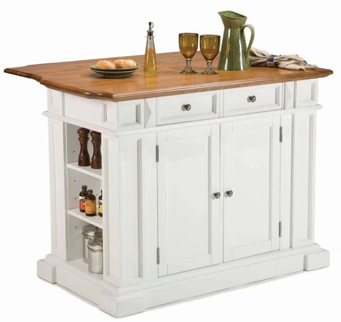 A freestanding island in white wood, featuring a natural wood top.