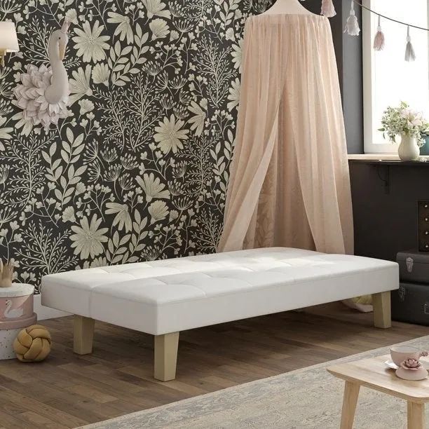 The white futon fully extended for comfort.