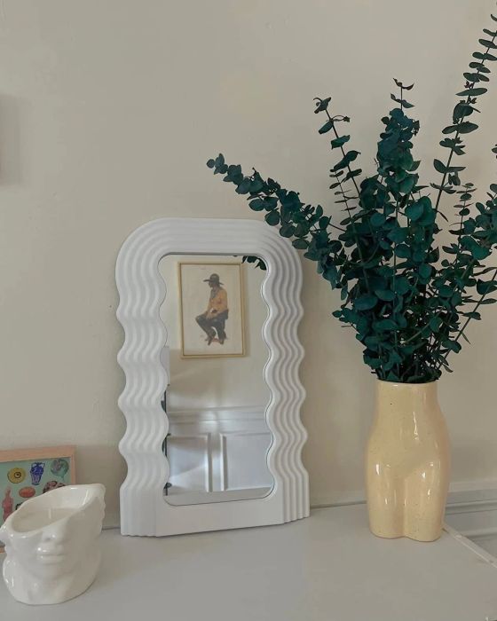 A customer's photo of the white wavy mirror