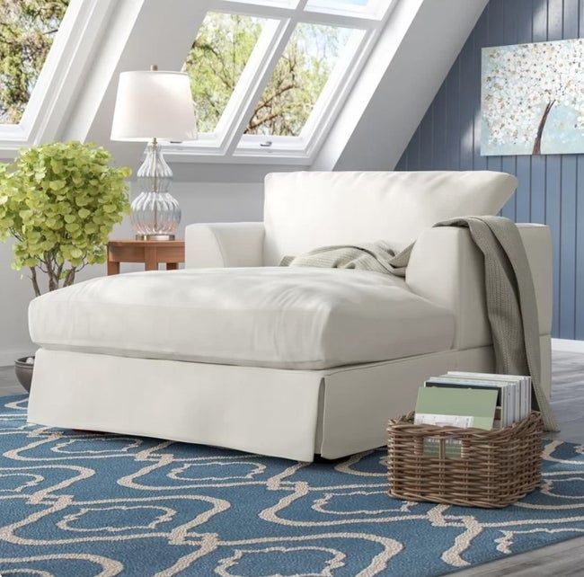 White chaise lounge placed in a living room