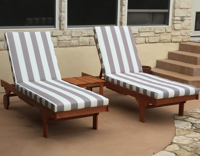 Reviewer photo showcasing two striped lounge chairs.