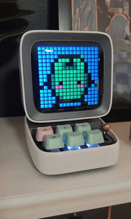 A gif of a junimo from Stardew Valley dancing on the Bluetooth speaker screen