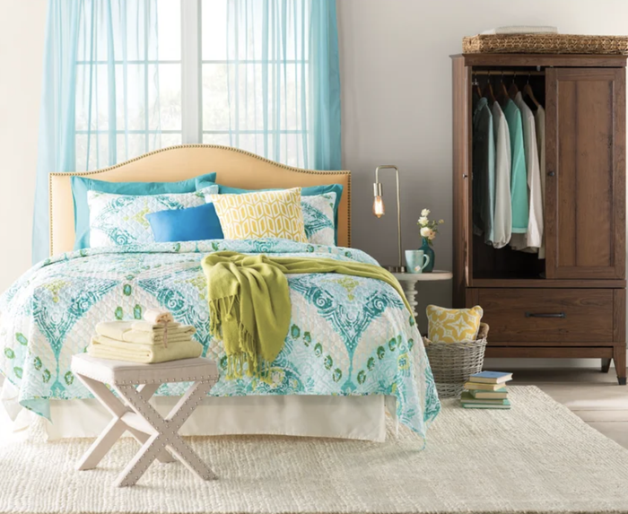 the armoire placed in a styled room