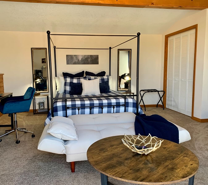 white version set up as a futon in the reviewer's bedroom