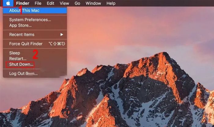 Chọn menu Apple và chọn Shutdown để tắt máy