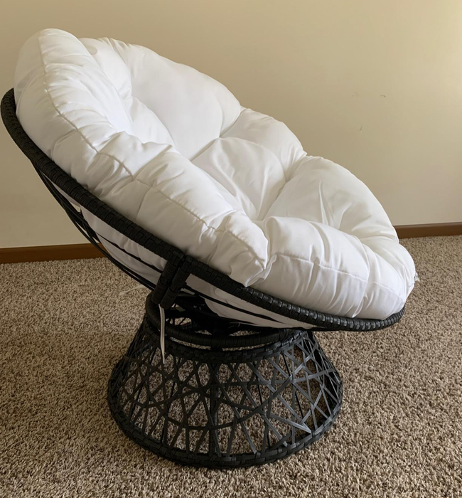 Customer image showing the side of the chair with a white cushion