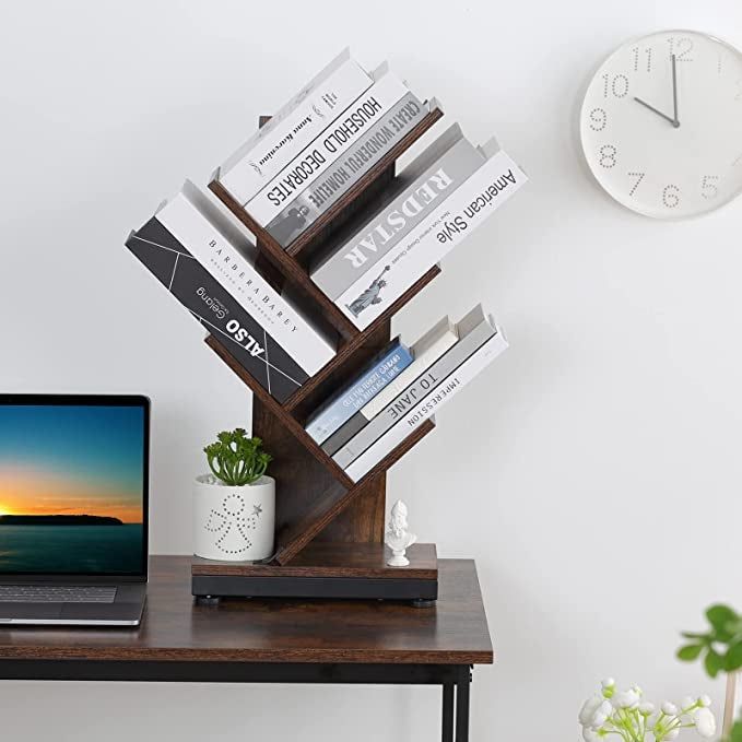 The wooden tree shelf placed on a desk