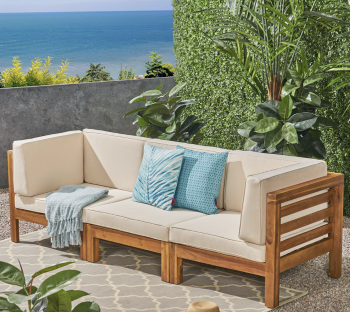 Same sofa, but this time with the cream-colored cushions.