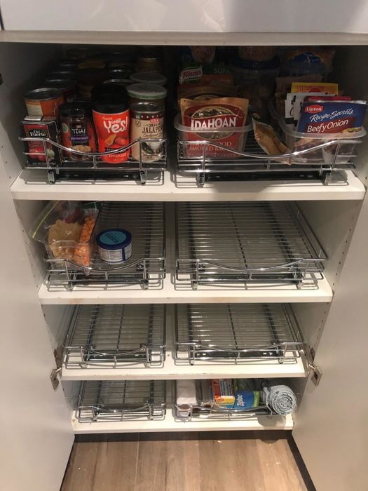 Reviewer image showing a cabinet with sliding shelves installed