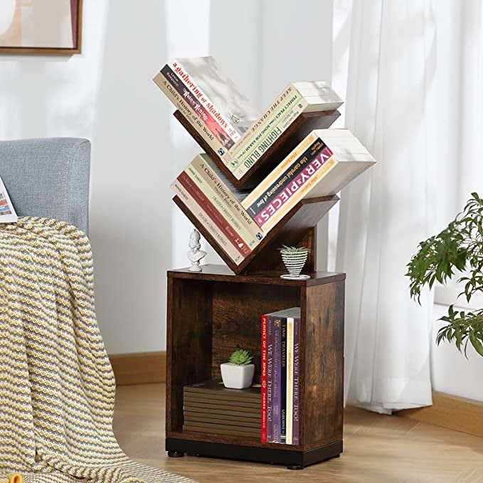 The wooden tree shelf standing on the floor