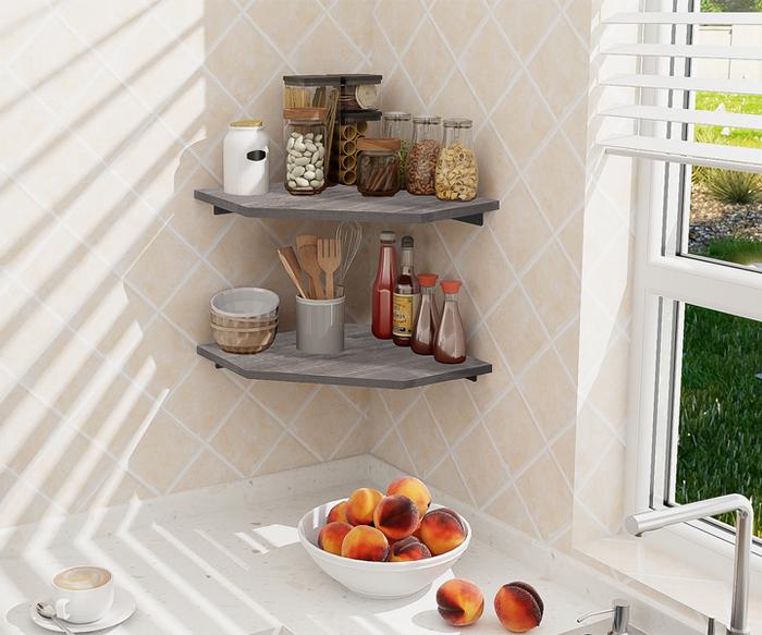 A modern kitchen corner shelf filled with various jars, spices, a mixer, and fresh peaches on the counter, beside a window that offers a view of a lush green lawn
