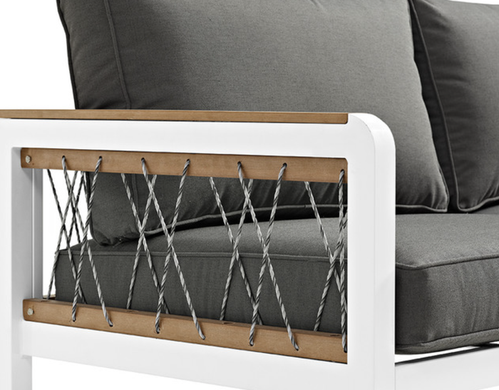 Close-up shot of the cord accents on the arms of the sectional.