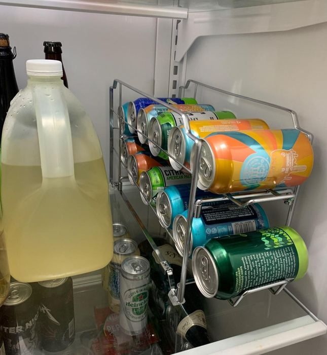 A reviewer uses a single rack to store multiple beers in the fridge