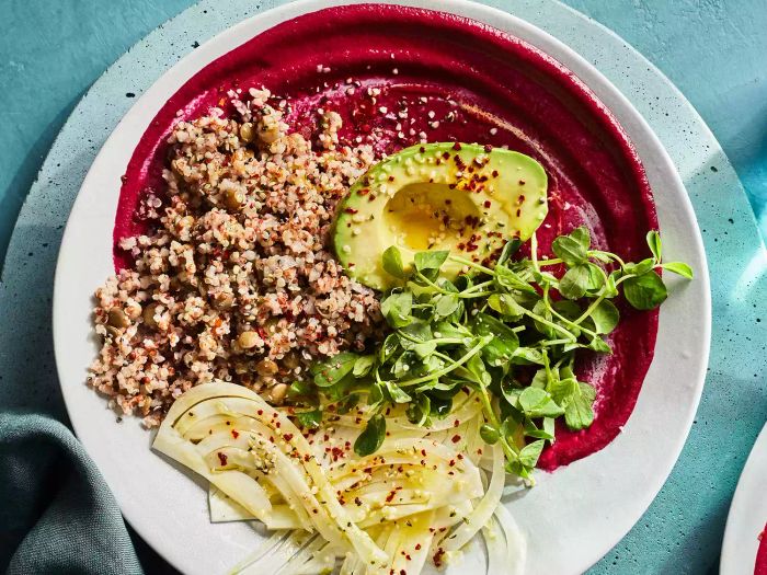 Bowl of Mixed Grains Topped with Beet and Ginger Dressing