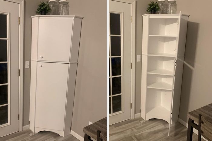 Image of a tall, narrow enclosed corner cabinet showcasing its interior