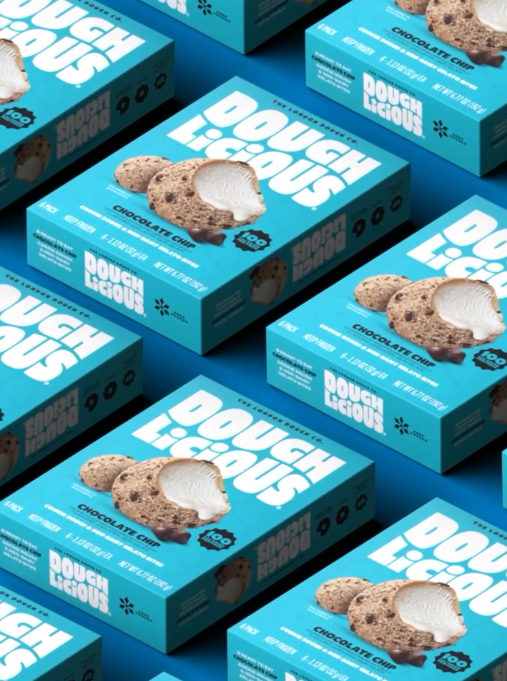 Boxes of Doughlicious chocolate chip cookie dough are arranged in an eye-catching pattern, highlighting the brand's packaging and design