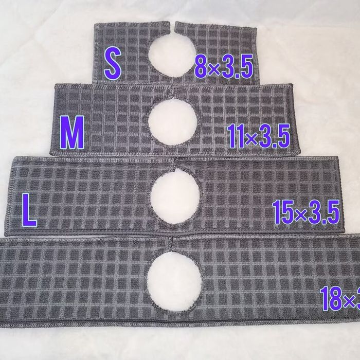 A stack of grey cloth drip catchers arranged in ascending order