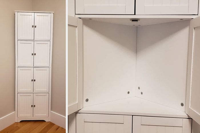 Image of a narrow white corner cabinet showcasing its interior shelves