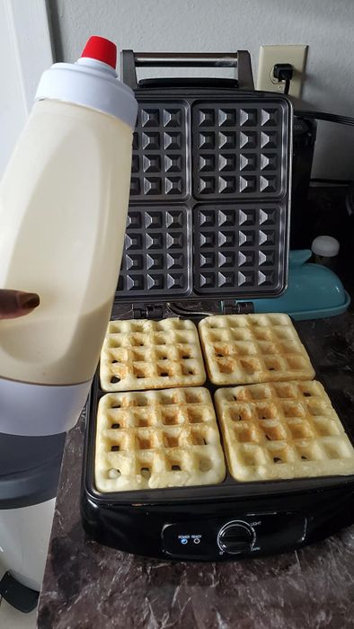 Golden, freshly cooked waffles ready to be enjoyed.