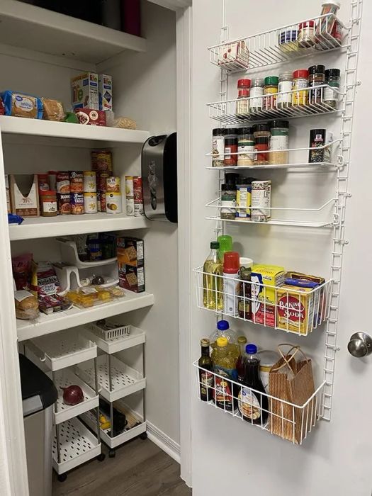 A reviewer's pantry closet featuring a six-tier organizer mounted on the door