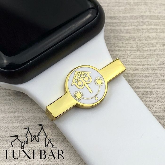 An Apple Watch attachment designed to look like the iconic clock from 'It's a Small World'