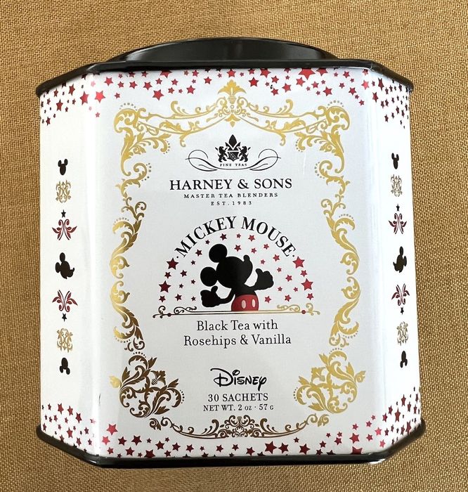 a white tin of tea featuring Mickey Mouse