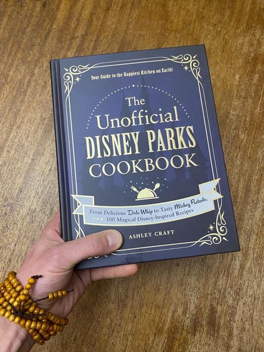 a reviewer holding the cookbook