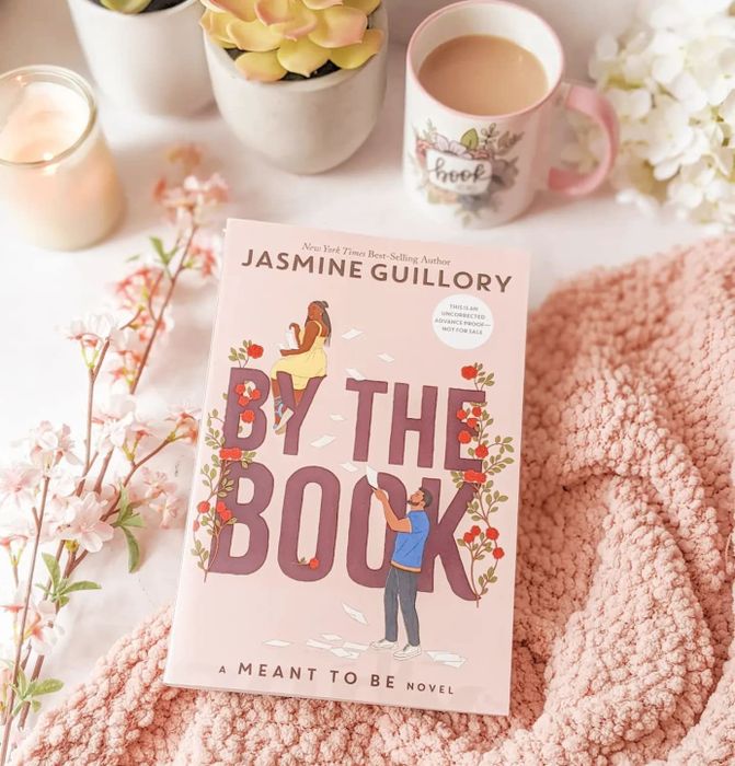 A reviewer’s photo of the book 'By the Book'