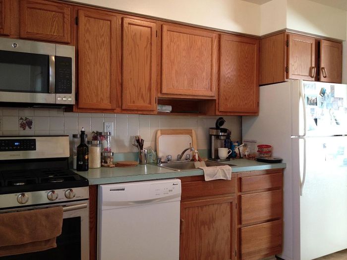 A reviewer's kitchen featuring a green kitchen counter.
