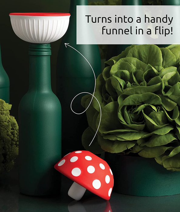 The mushroom funnel resting beside a bottle, with the funnel's opening inverted inside the bottle's top