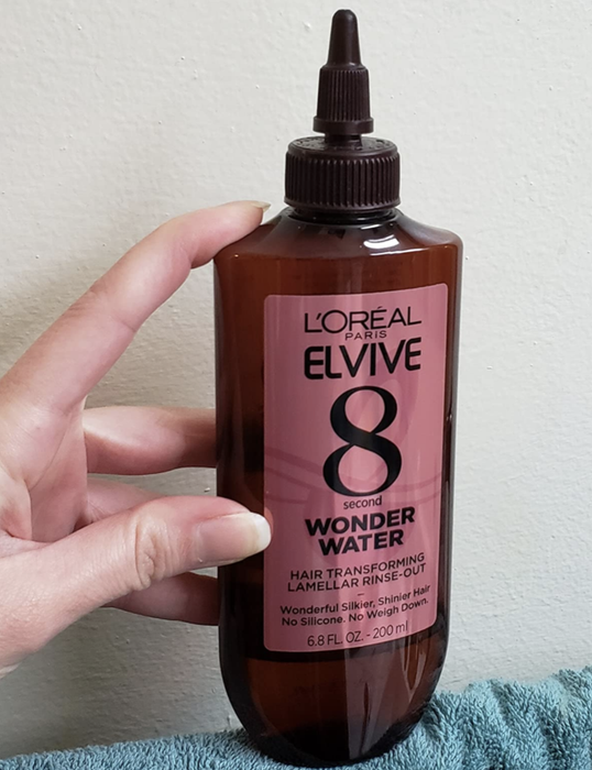 A customer review photo showcasing the bottle of L'Oreal Paris Elvive 8 Second Wonder Water.
