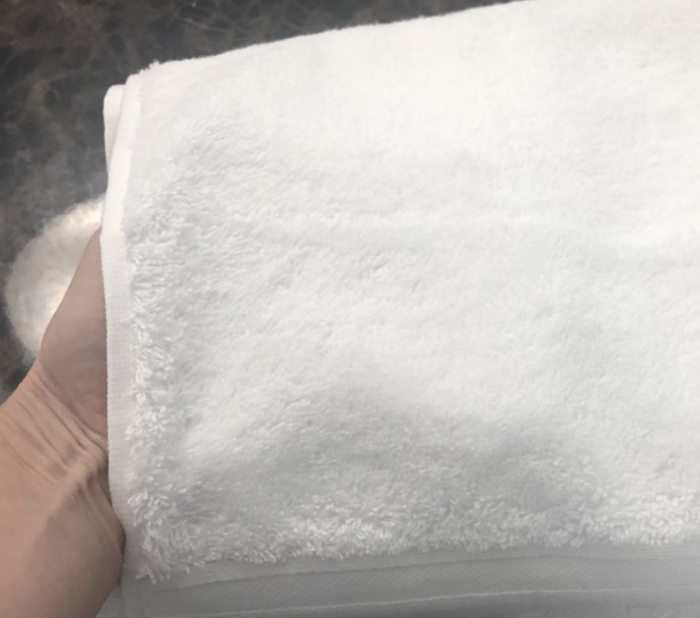 A customer review photo showing a close-up of the towels