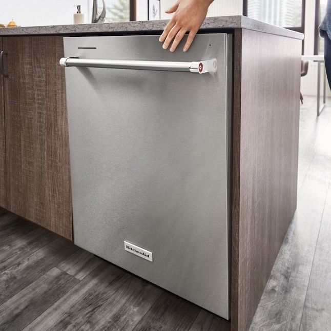 A sleek stainless steel dishwasher seamlessly integrated into a kitchen island