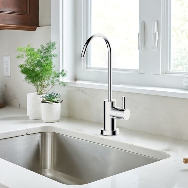 A sleek silver cold water dispenser/faucet