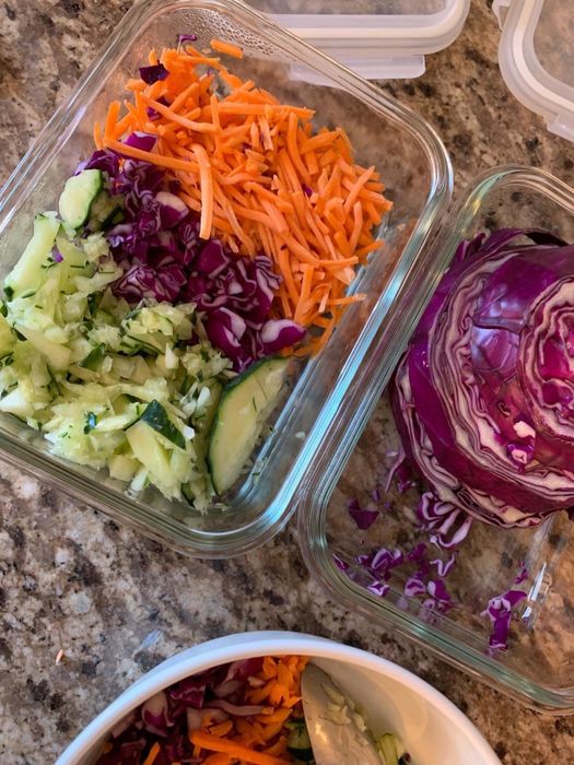 Review image of meal prepped food stored in a container