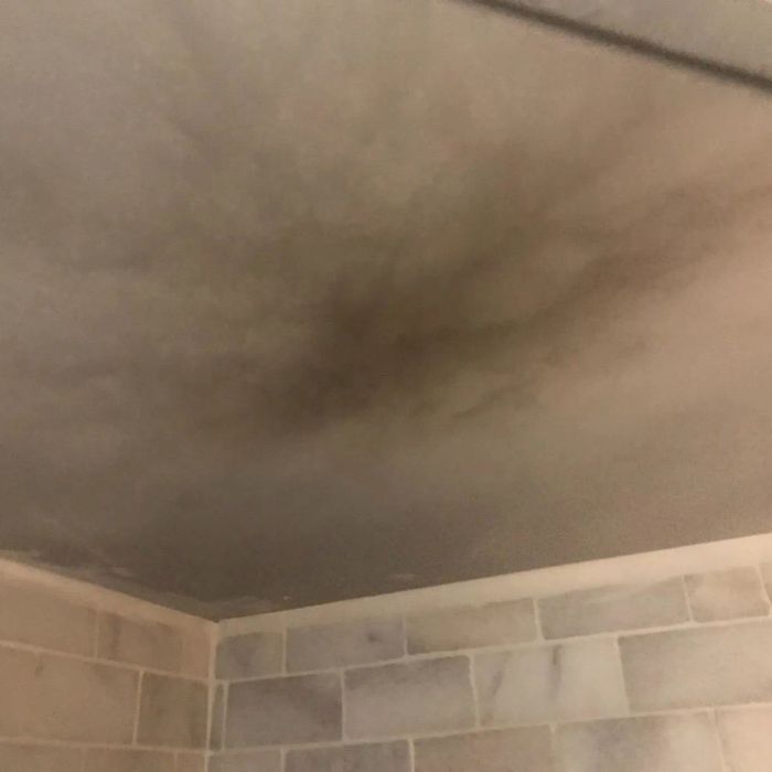 The same reviewer's ceiling showing smoke damage caused by the toaster oven.