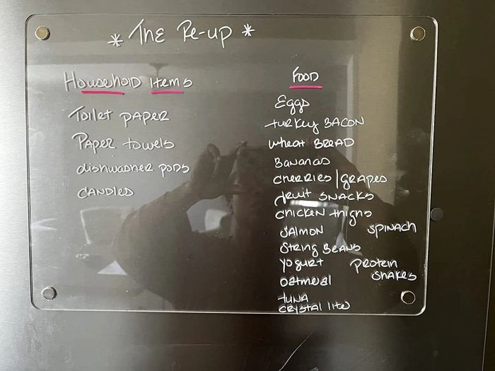 A clear fridge dry-erase board, as shown by the reviewer.