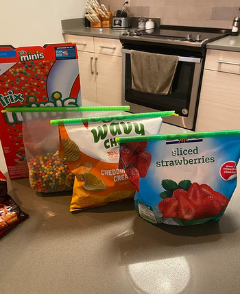 Various chip and fruit bags sealed tightly with one of the Gripstic clips
