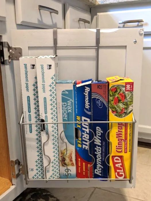 A reviewer showing off their plastic wrap, tinfoil, and similar items neatly stored in the organizer.
