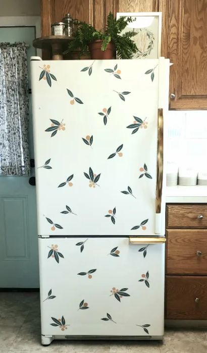 reviewer's fridge adorned with tangerine decals
