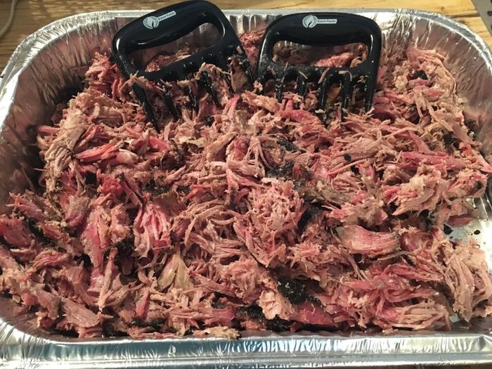 A large platter filled with shredded meat