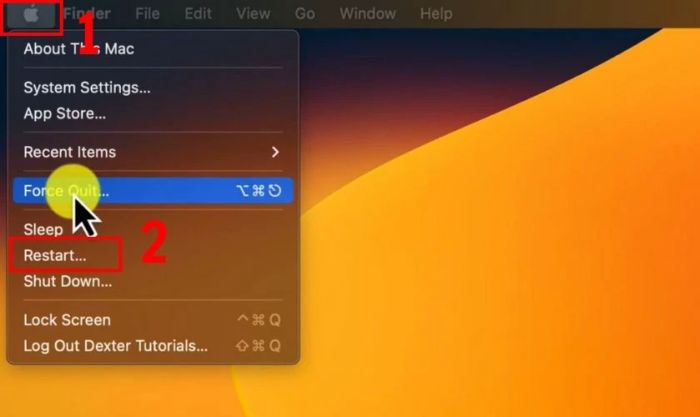 Vào menu Apple và chọn Restart.