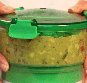Animated gif: hands press down on the lid of the container to remove excess air