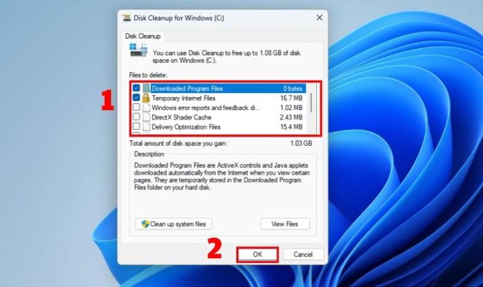 Trong cửa sổ Disk Cleanup, tích chọn các loại tệp tin rác cần xóa, rồi nhấn OK